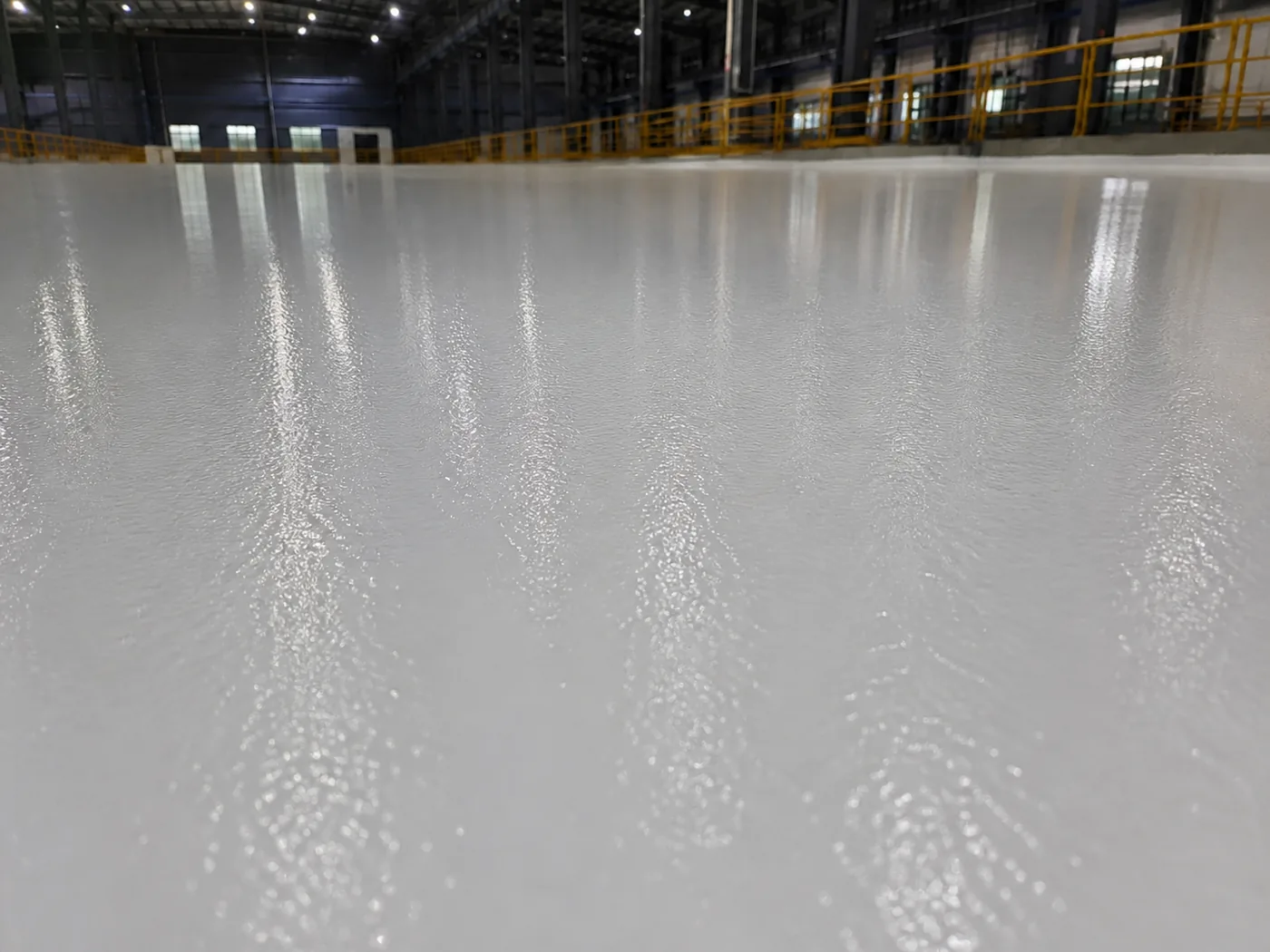 Detail view of BW0-8027 abrasion-resistant polyaspartic floor coating on concrete