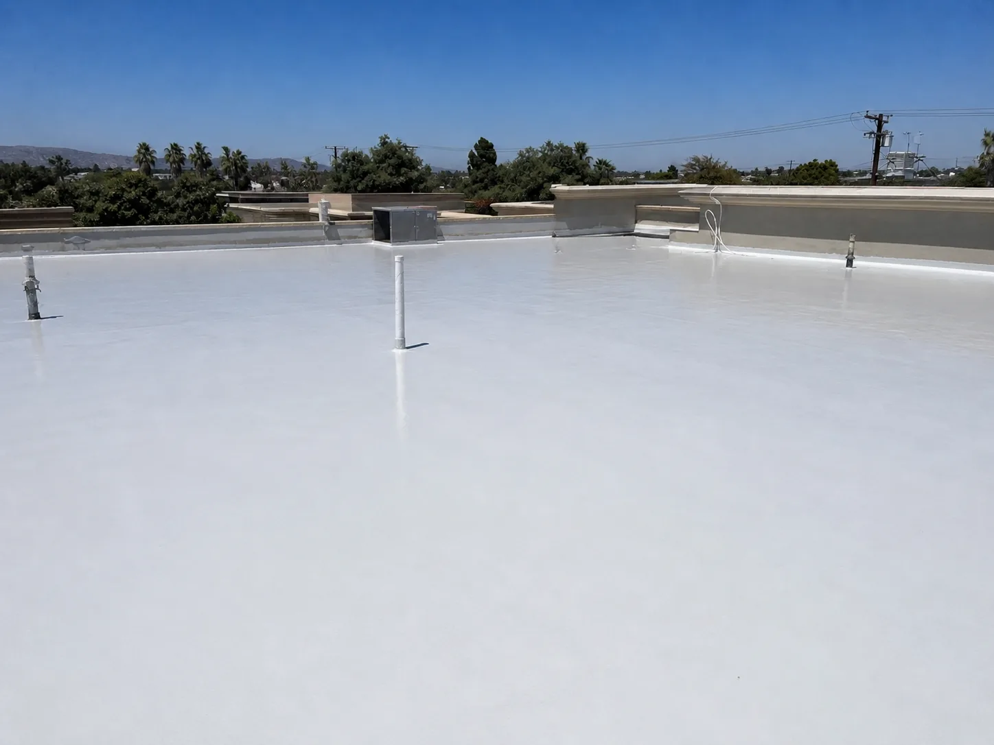 BW0-8029 polyaspartic protective topcoat applied on a roof surface for weather-resistant protection
