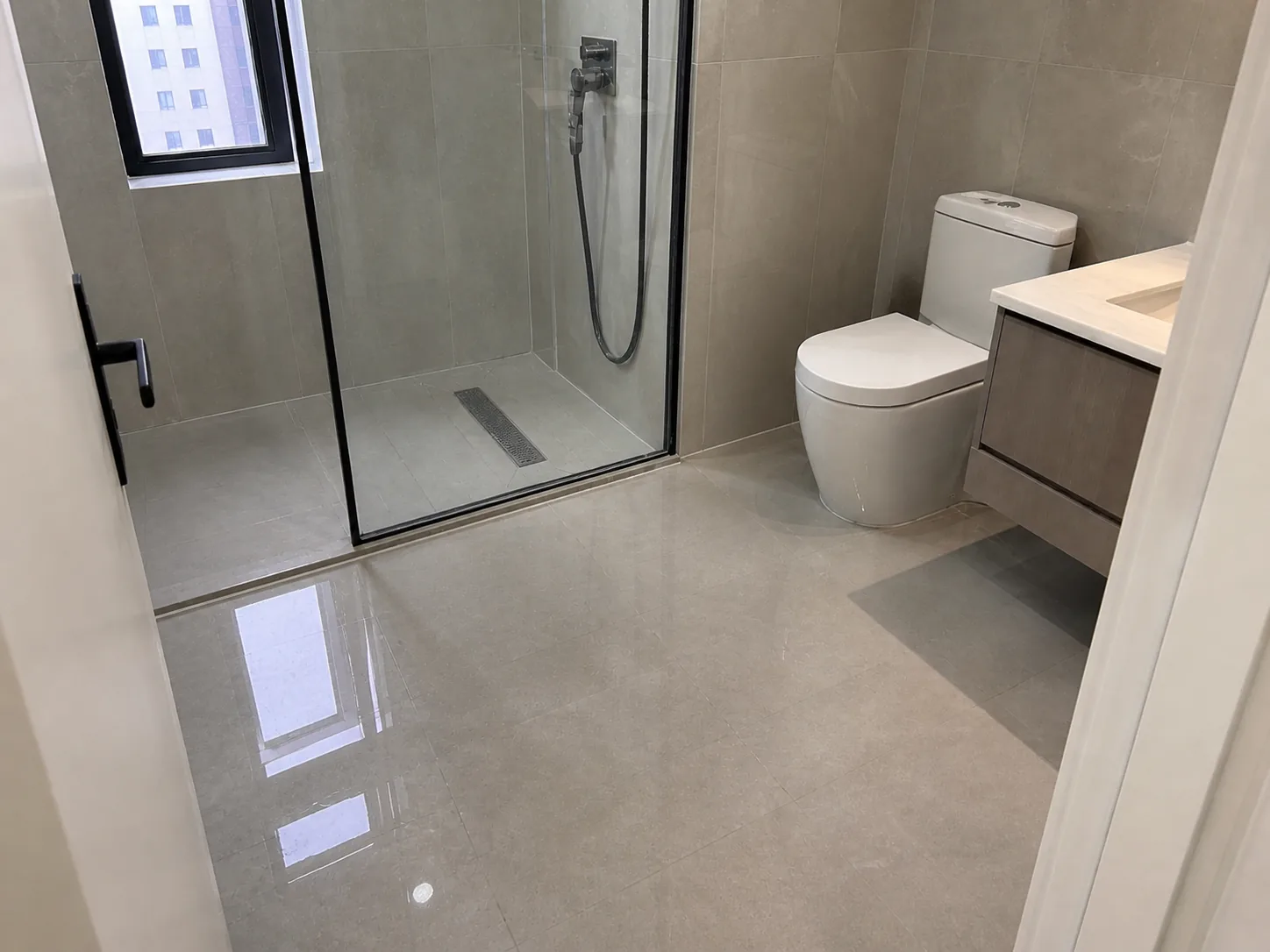 BW0-8031 polyaspartic no-demolition tile waterproof protective coating in a bathroom wet area