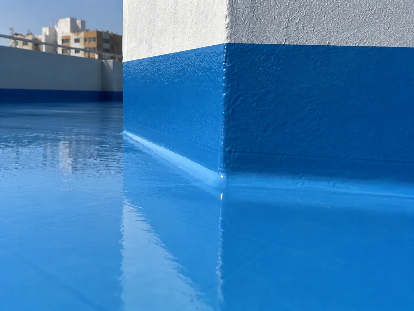 Weather-resistant BW0-8032 polyaspartic topcoat edge detail on an outdoor protective surface
