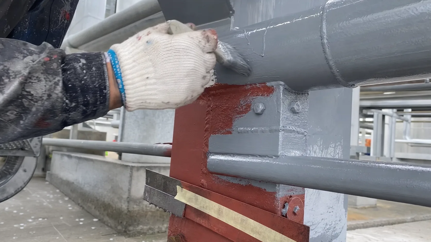 Brush detail of BW6-959 moisture-cure anticorrosion coating on metal support and pipe surfaces