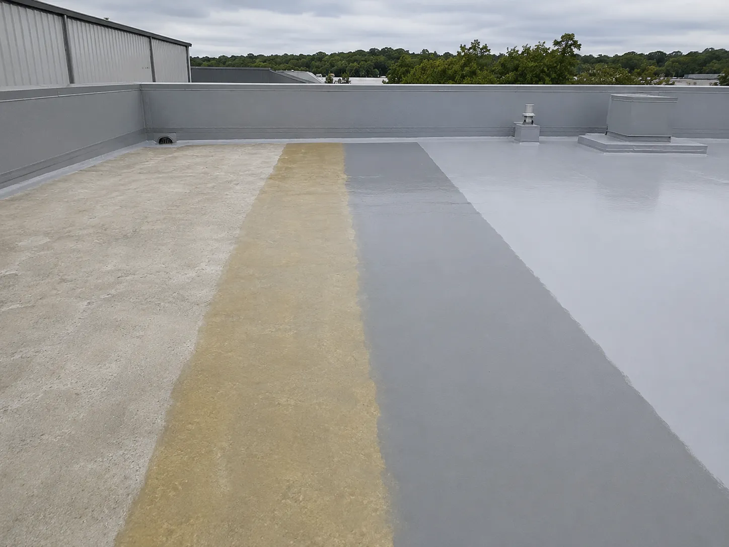 Concrete roof polyurea waterproofing system with primer, seamless membrane and weather-resistant topcoat