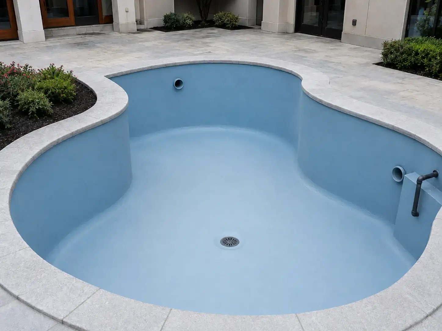 Finished hand-applied tank and swimming pool waterproofing surface with BW0-8029 protective topcoat