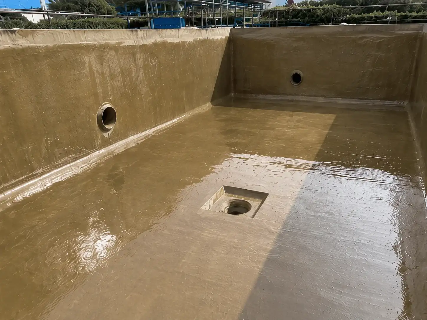 BW8010 concrete primer application inside wastewater tank