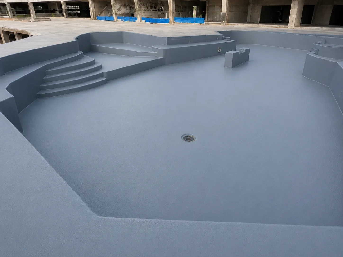 BW3-900 spray polyurea application forming the main pool waterproofing membrane
