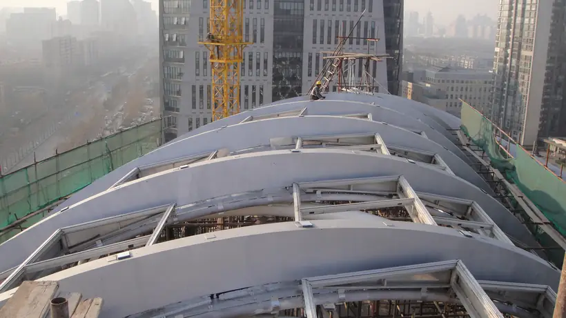 Curved building steel frame with BW0-8028 protective topcoat
