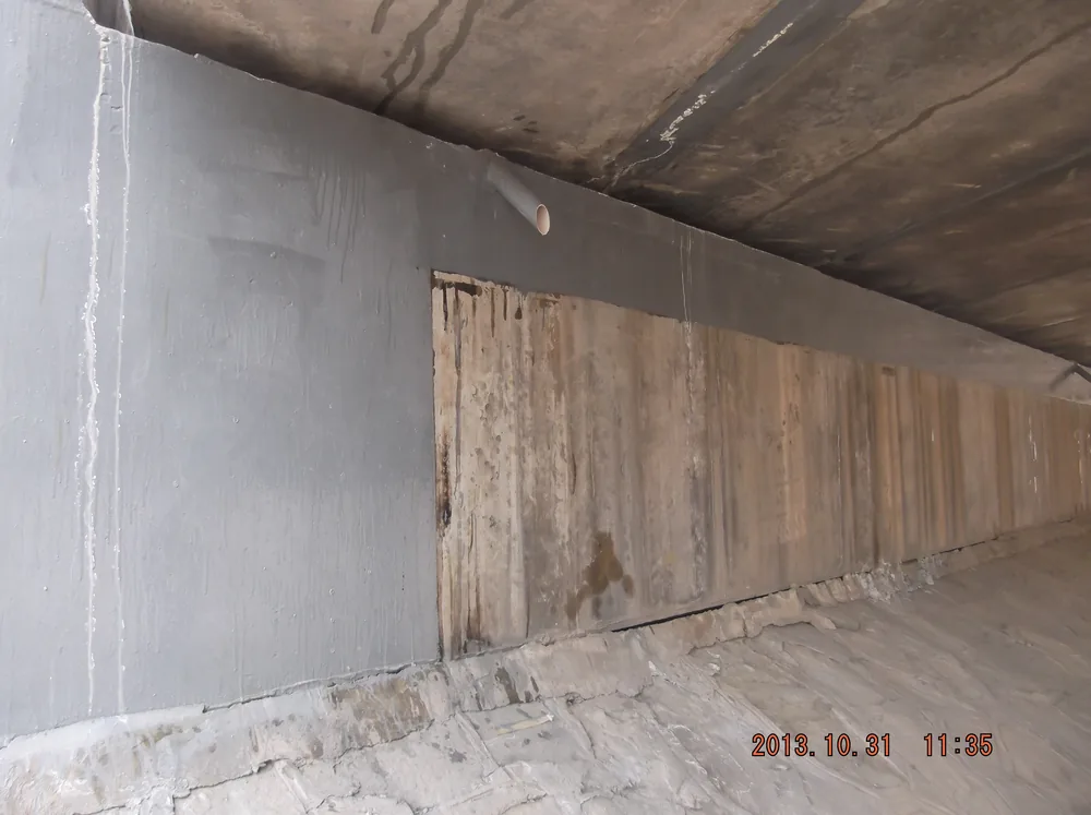 Bridge underside detail with finished protective coating around local repair area