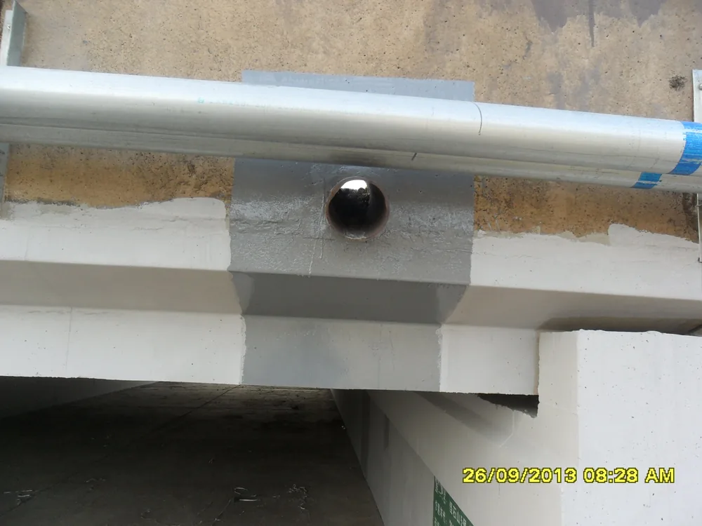 Bridge pier and beam connection detail with waterproofing repair coating