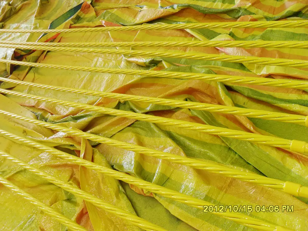 Close-up of coated bridge steel strand with spiral surface profile