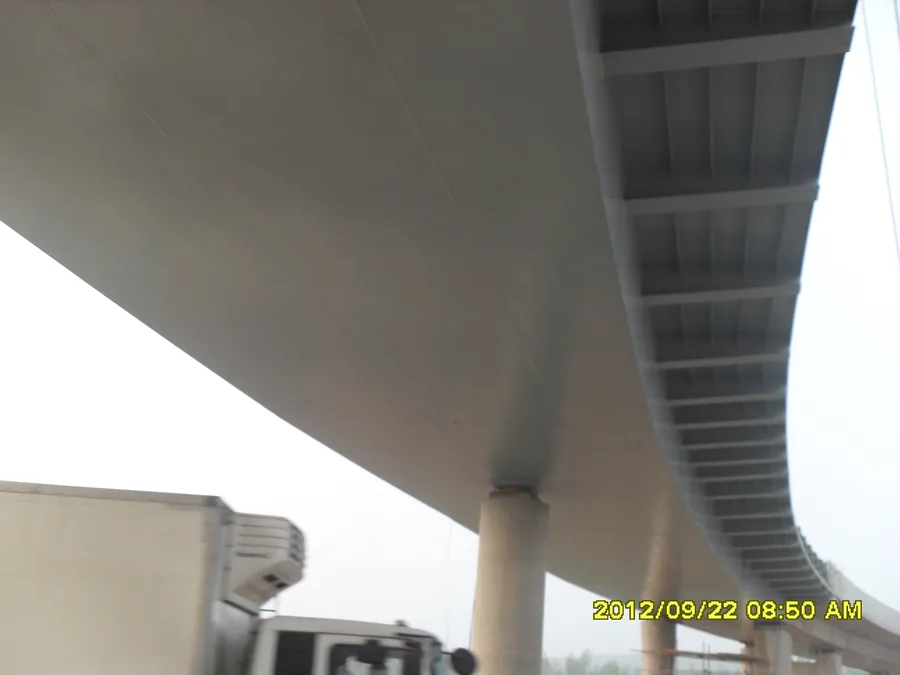 Bridge underside and edge steel railing structure before protective coating