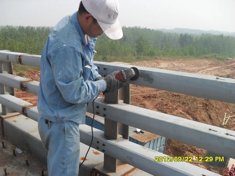 Bridge guardrail surface after local anti-corrosion coating work