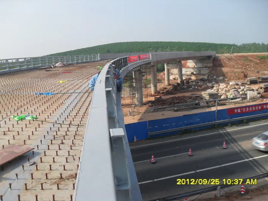Bridge guardrail connection plate and bolt areas with anti-corrosion coating