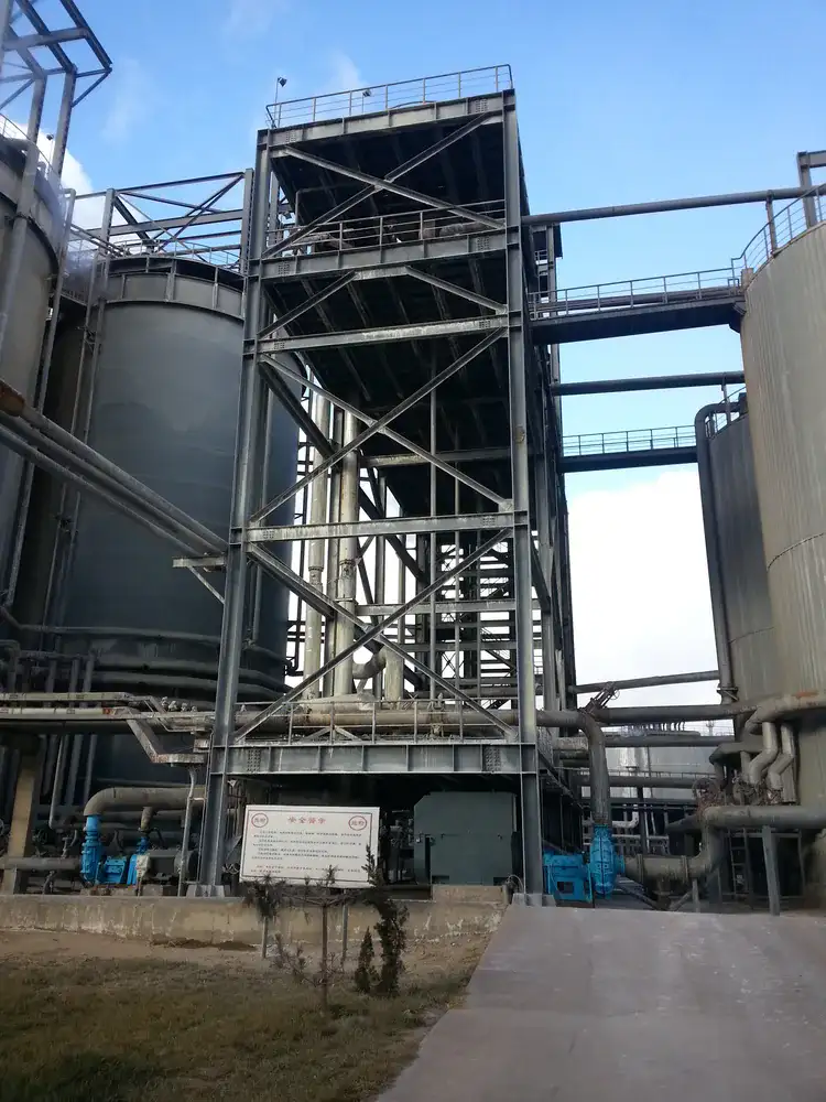 Exterior industrial steel frame and pipe rack prepared for anti-corrosion coating