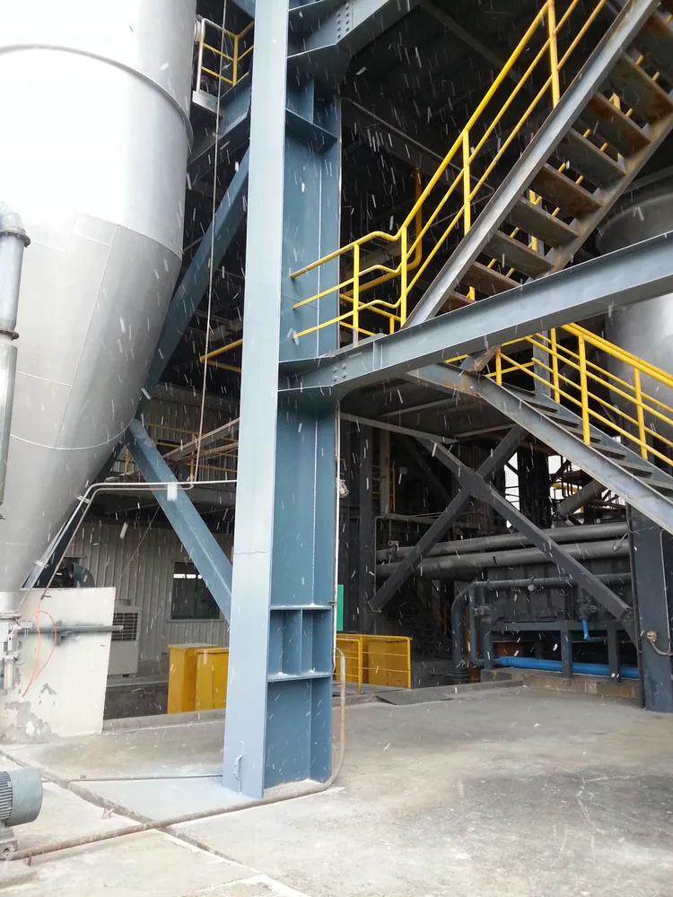Coated steel column and platform detail in industrial plant