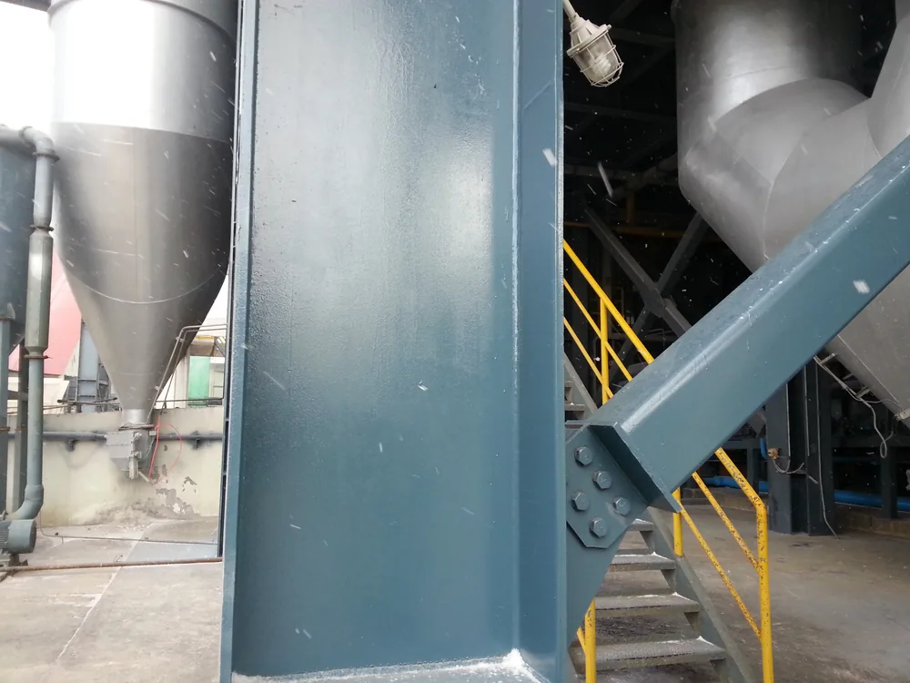 Close-up of anti-corrosion coating on steel structure connection detail