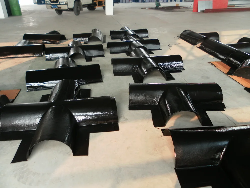 Finished black spray polyurea coating on dam equipment parts