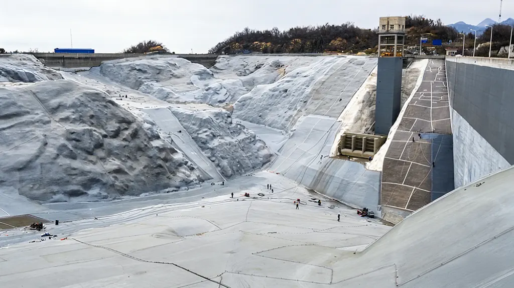 Large reservoir concrete surface with polyurea waterproofing protection