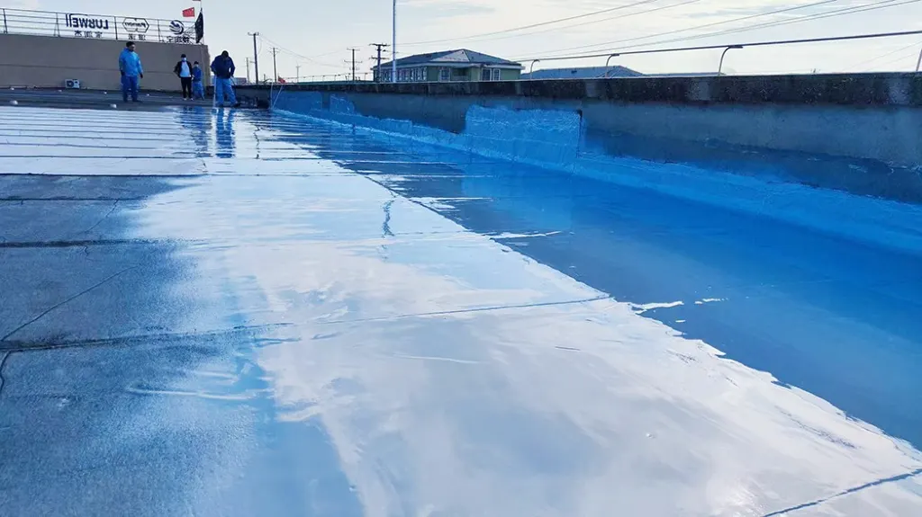 Freshly applied polyurea coating on old waterproofing layer