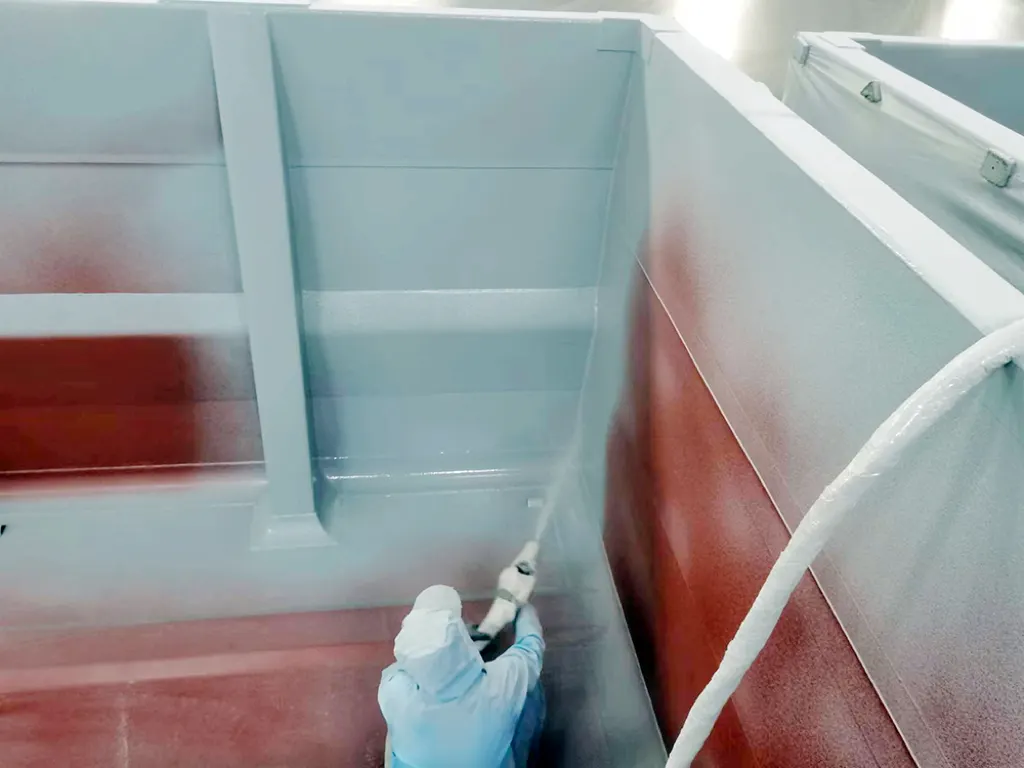 Polyurea edge coating detail for mining truck bed
