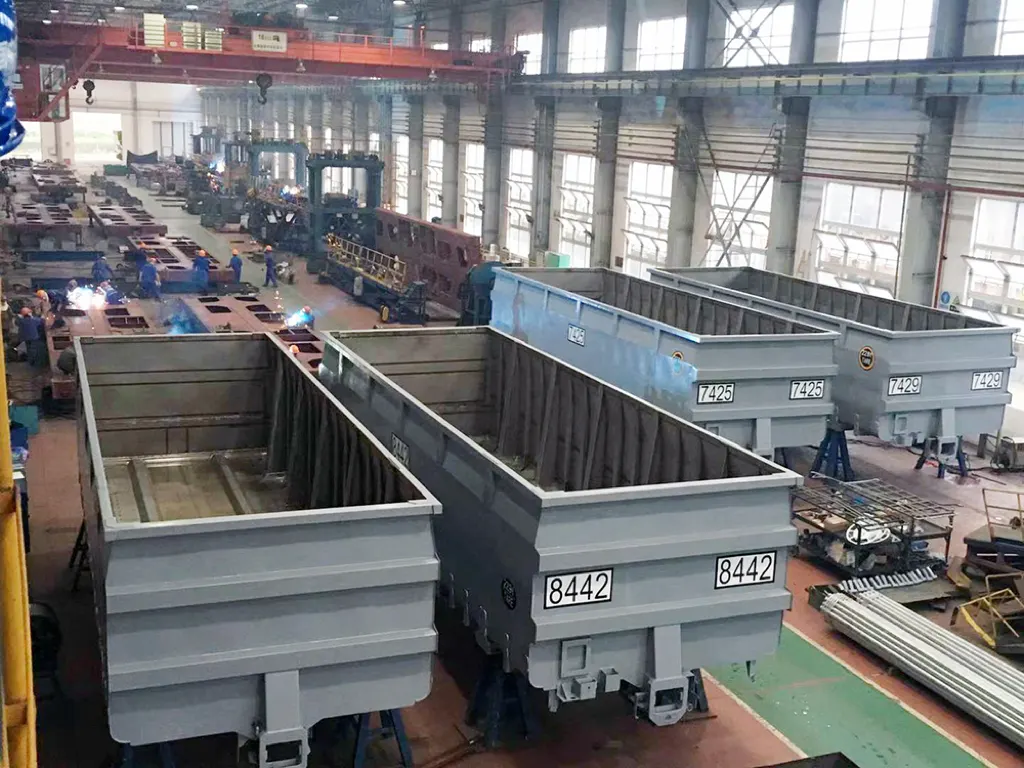 Mining truck bed protection work in industrial workshop