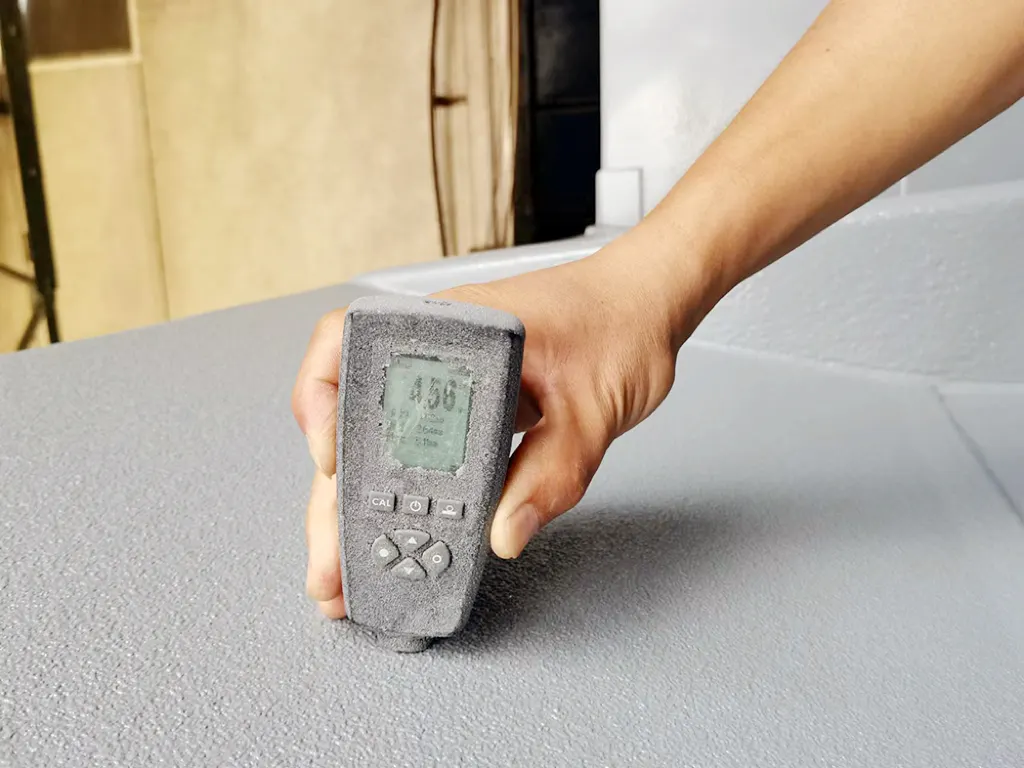 Quality inspection of polyurea coating on mining truck bed