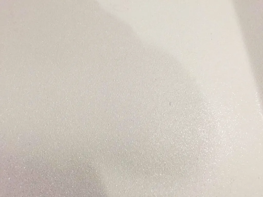 Abrasion-resistant polyurea coating texture on truck bed liner