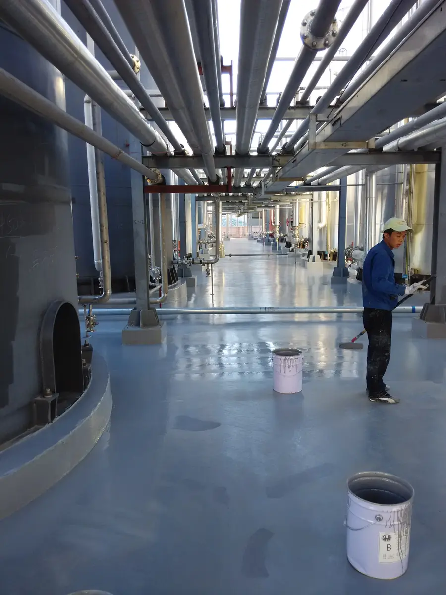 Outdoor anti-corrosion flooring protection around chemical tank area