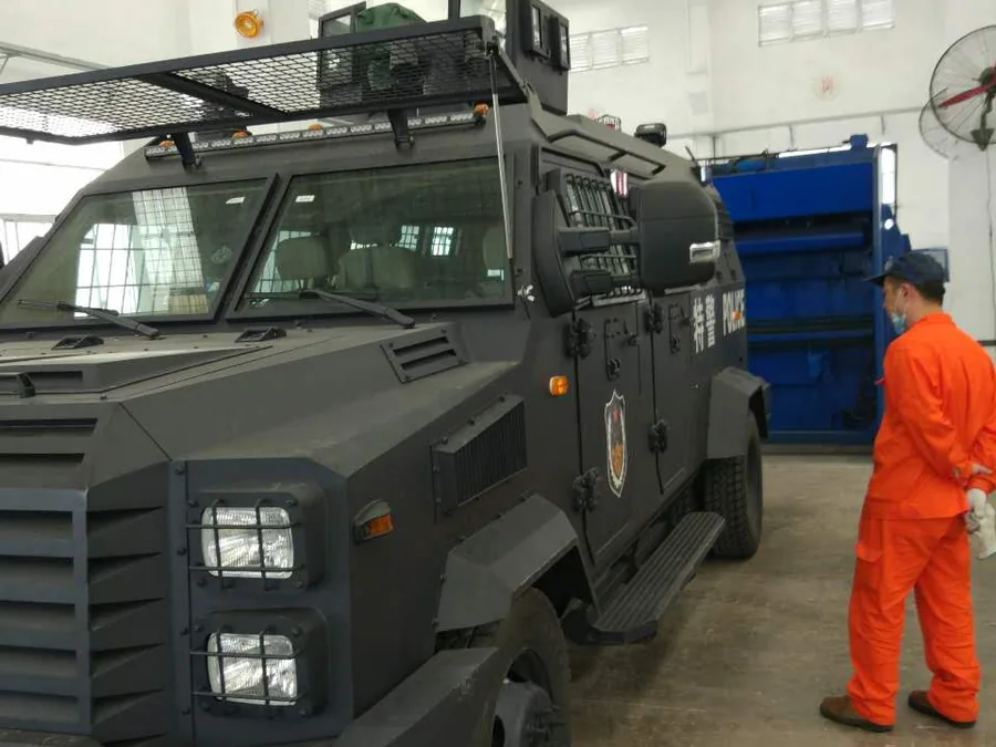 Riot control vehicle exterior surface protected with BW3-319 spray polyurea and BW0-8029 topcoat