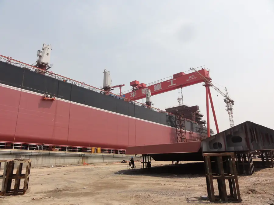 Ship exterior hull side shell with finished protective coating surface