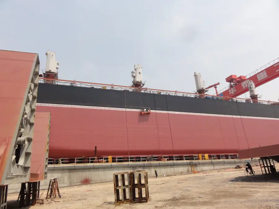 Marine steel hull plate joints and weld areas with protective coating