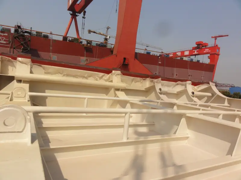 Internal hull-section steel ribs with continuous spray polyurea coating