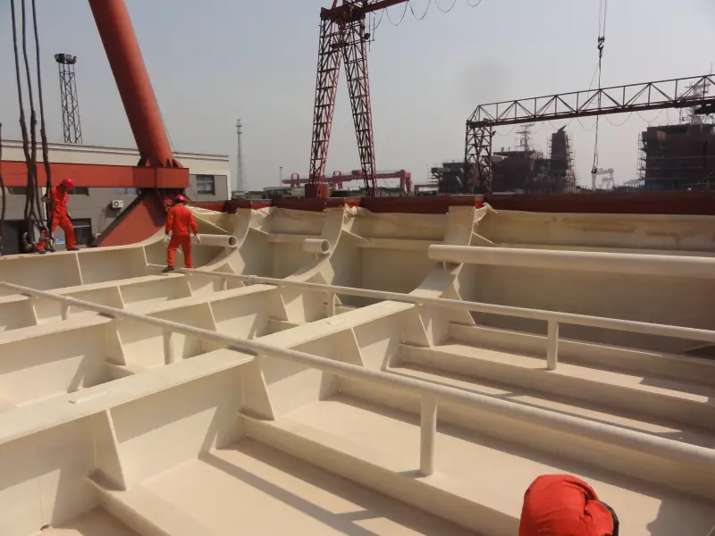 Hull-section compartment steel surface with continuous protective membrane