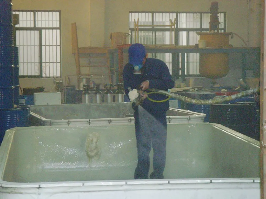 Spray polyurea coating process detail on equipment shell