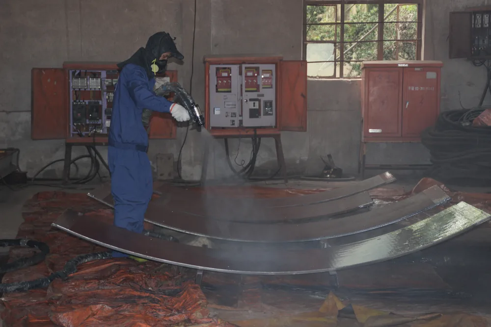 Spray polyurea coating application on tunnel steel plate