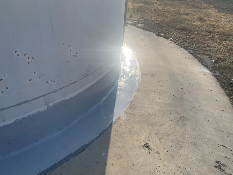 Wind turbine tower-bottom base protected with BW6-8526 hand-applied polyurea